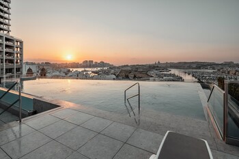 Indoor pool, seasonal outdoor pool, pool umbrellas