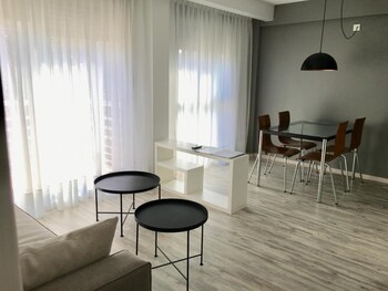 Apartment, 1 Bedroom | Living area | 32-inch Smart TV with cable channels, TV, Netflix