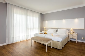 Family Suite, Balcony | Minibar, in-room safe, individually decorated, individually furnished