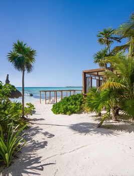 Private beach, white sand, free beach cabanas, sun loungers