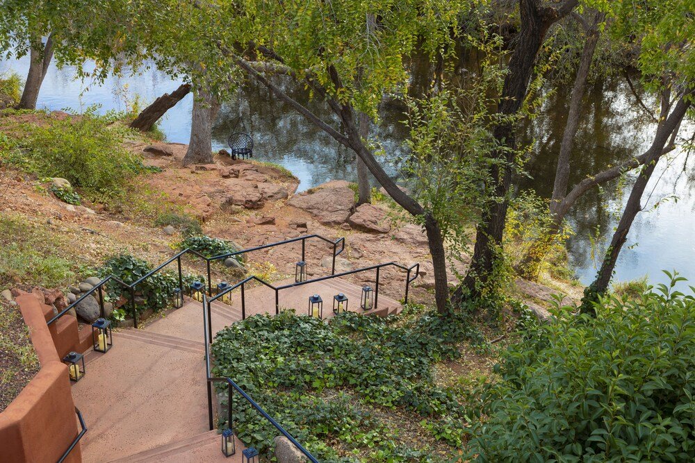 Stone staircase leading down toward the creek at Amara in Sedona