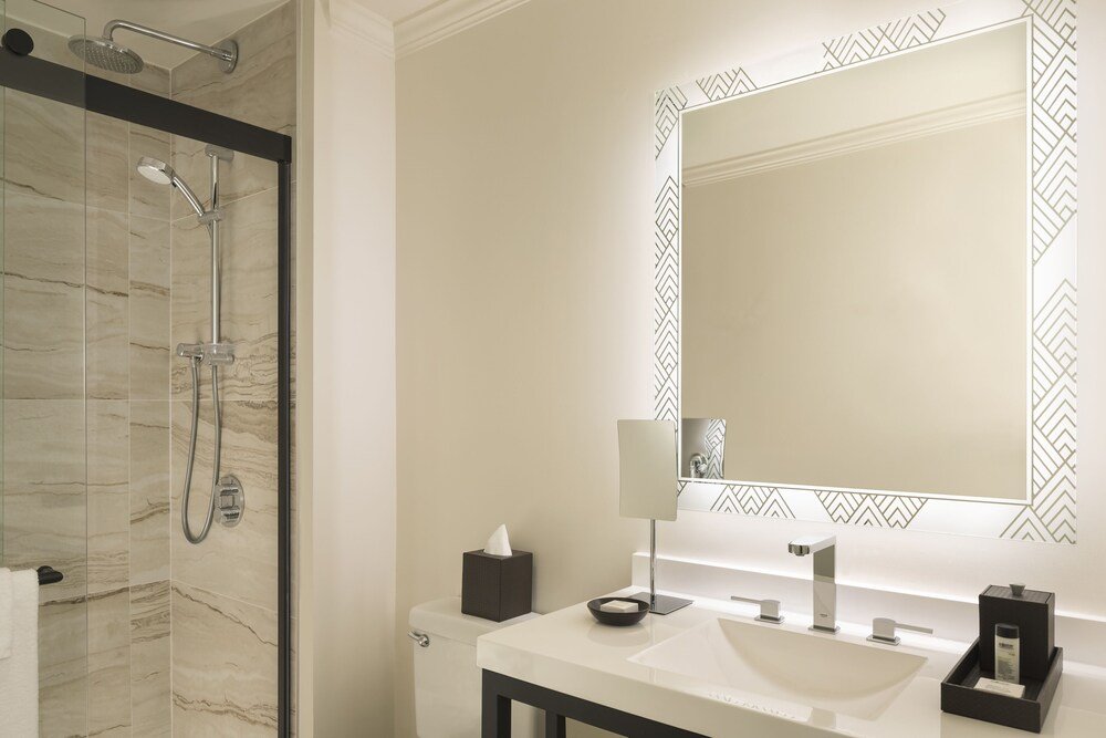 Bathroom with a glass-enclosed shower at Amara Resort and Spa