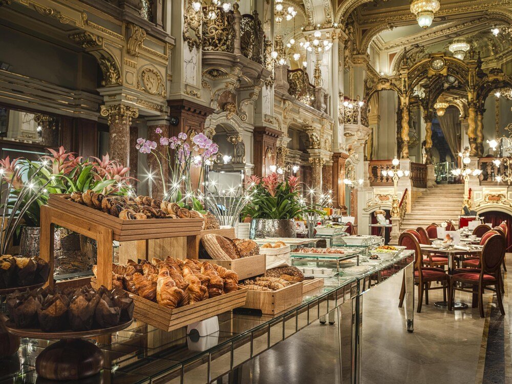 Luxurious hotel lobby with ornate architecture at Anantara New York Palace Budapest