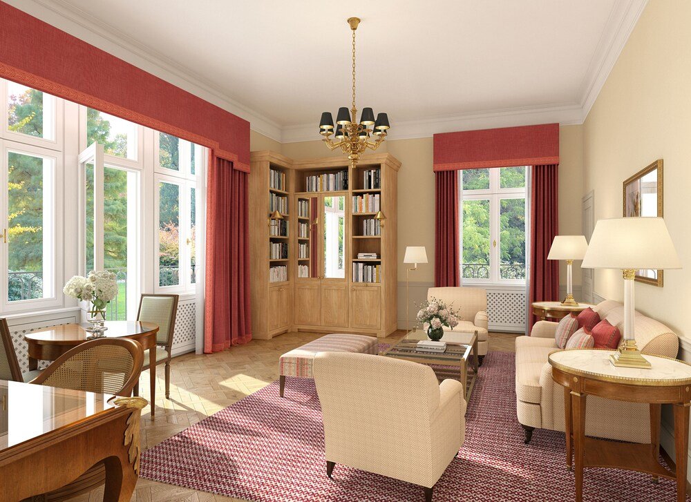 Amplio living con biblioteca en una suite del hotel