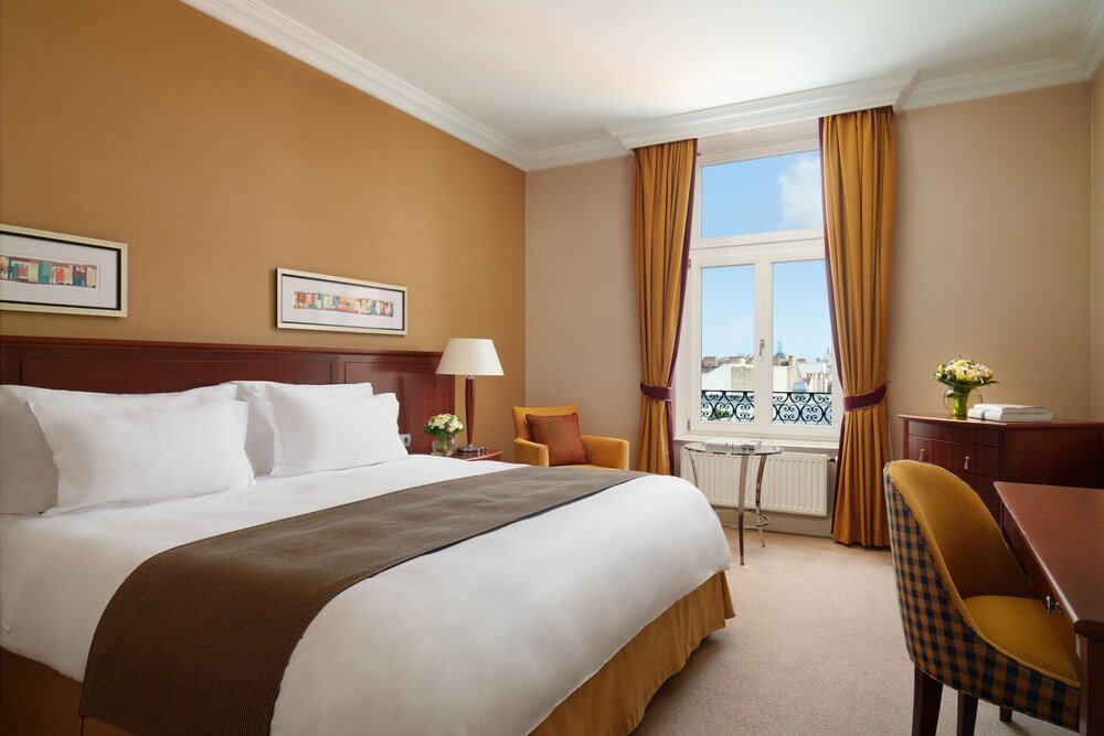 Hotel room with a desk by a window